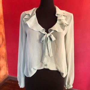 Super elegant and cute mint green top
